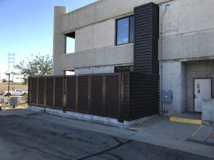The PalmSHIELD louvered fence installed outside of a City of Los Angeles Department of Water and Power building marrying up perfectly with the adjoining structure