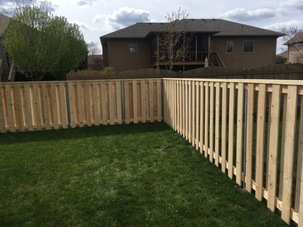 American Fence Company Sioux Falls, South Dakota. Commercial Wood Fence Panels.